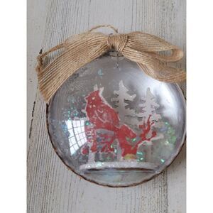 Red cardinal bird at snow pine tree ornament Xmas decor